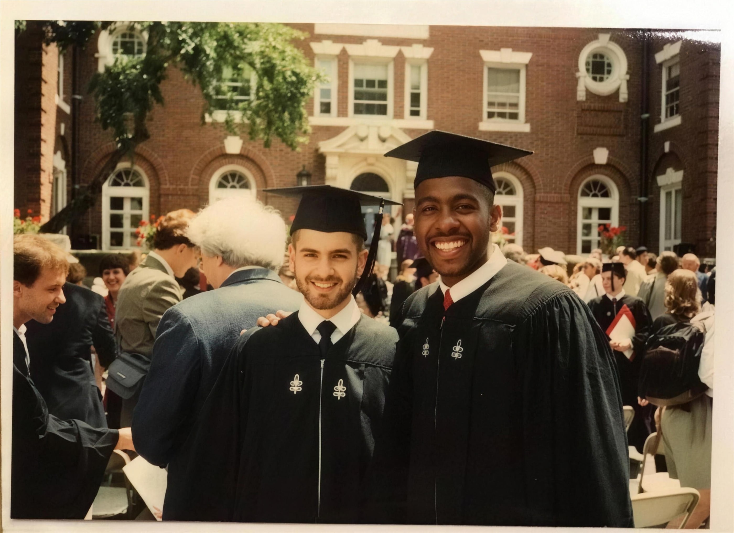 Carlos Watson in a graduation gown