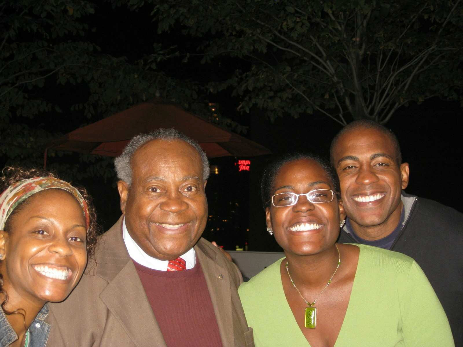 Carlos Watson with Dad and Sisters